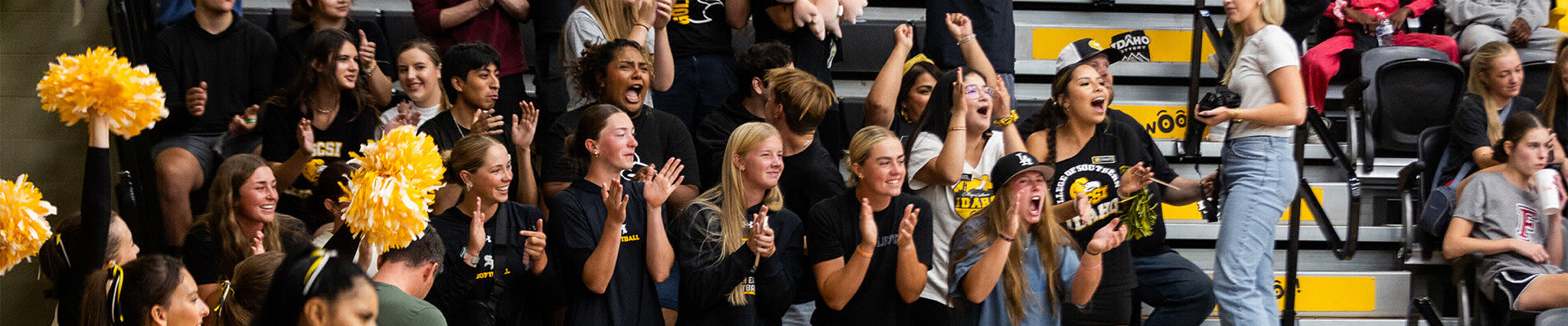 students cheering at a game