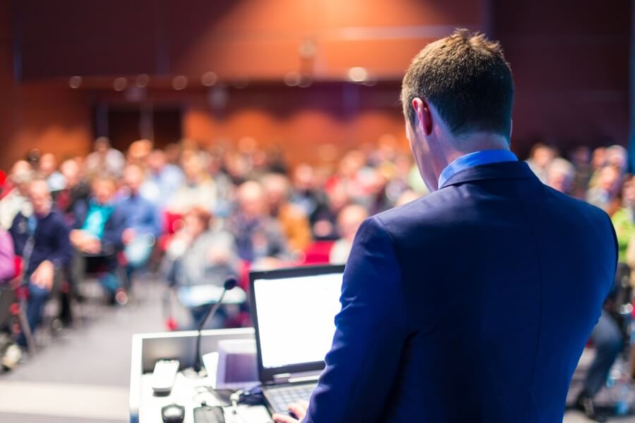 Presenter overlooking a crowd