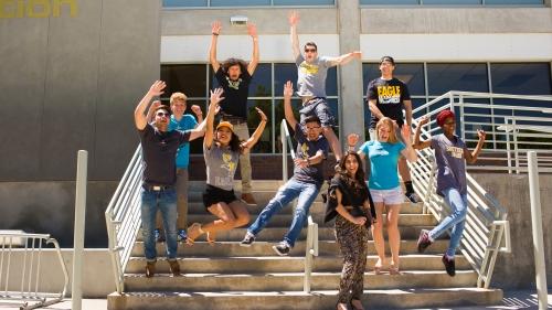 students celebrating together on the rec center steps