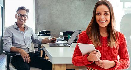 a man and a woman in an office
