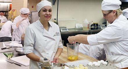 students working in a kitchen