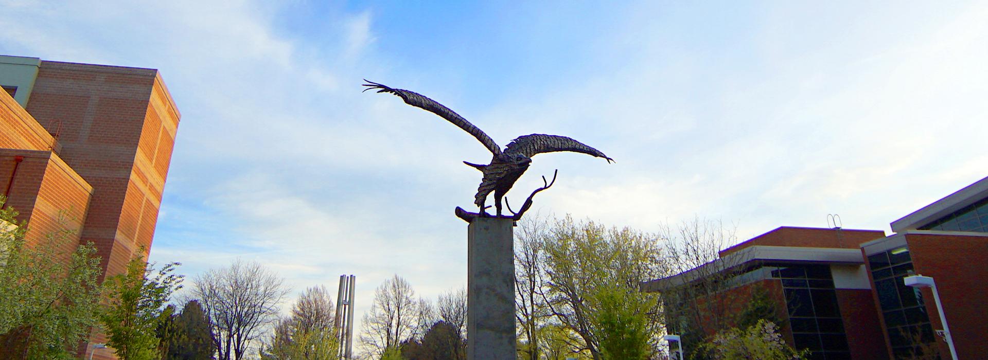 Eagle statue with blue sky behind
