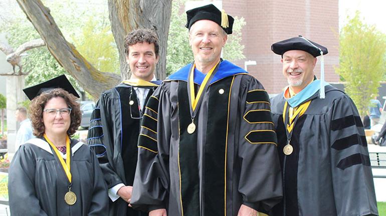 provost and deans at graduation