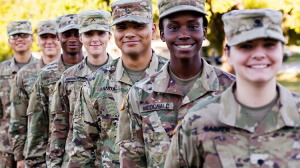 military service members in uniform smiling