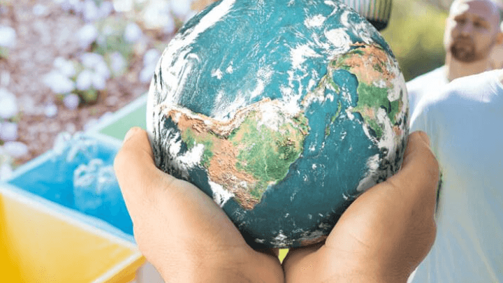 globe in hands