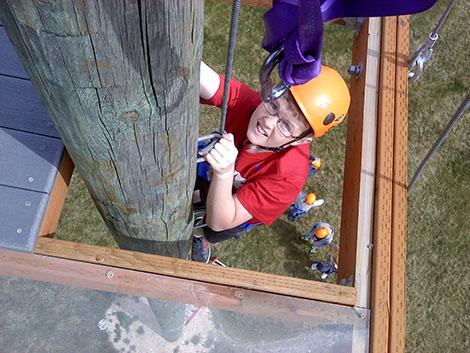 climbing a tall pole