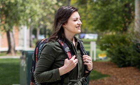 student walking on campus