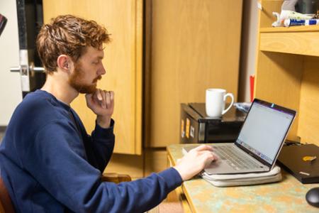 A man using a computer.