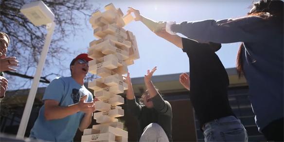 Image of CSI students playing a game together at a Student Services event.