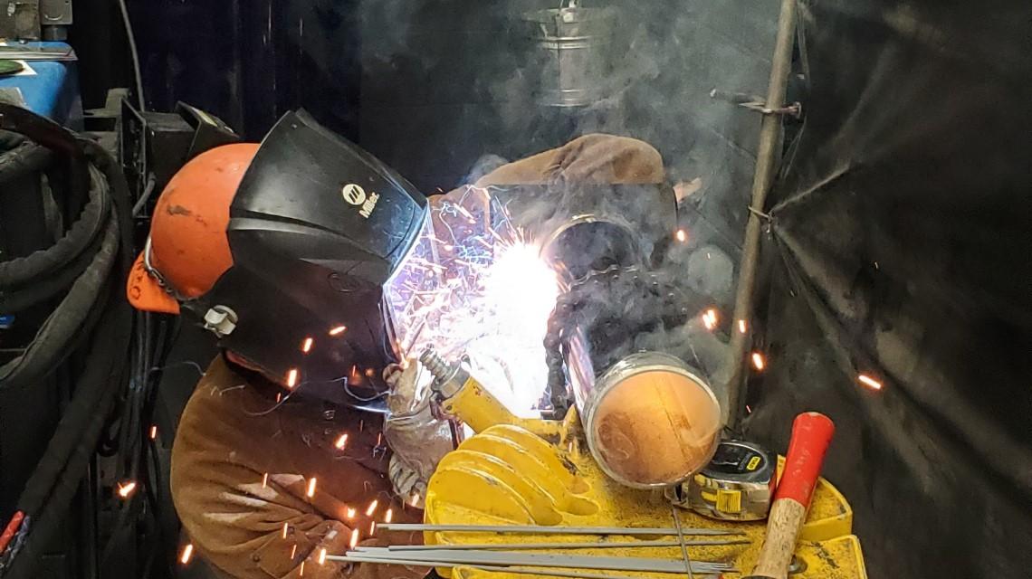 a person in welding safety gear